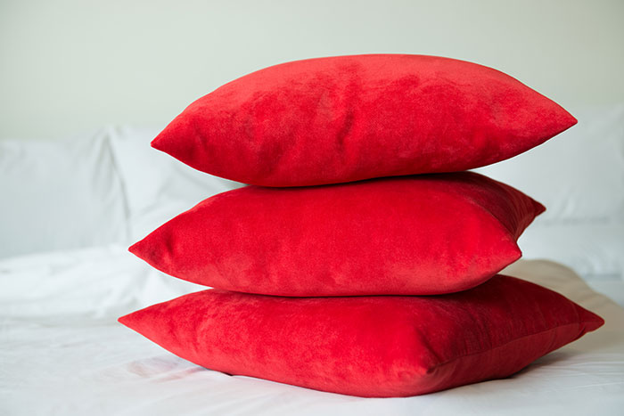 Red pillows stacked